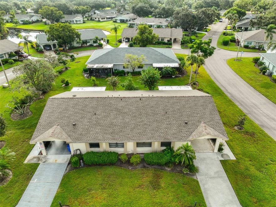 Welcome to this refreshed Cypress III model, perfectly situated on a desirable corner lot in Kings Point. This 2-bedroom, 2-bath villa offers 1,150 sq. ft. of comfortable living space with a spacious living/dining combination and an attached carport for convenience. The updated kitchen features stainless steel appliances, ample cabinetry, generous counter space, and a cozy breakfast nook by the window. The bedrooms are separated for privacy, Primary Closet is large 5" x 6" and the home includes a closet with a washer and dryer. Relax on the expansive 18’ x 8’ screened lanai, overlooking manicured lawns—an ideal spot for enjoying Florida’s sunshine.

As a resident of Kings Point, you’ll enjoy an unmatched 55+ lifestyle within a secure, gated community. Amenities include two large clubhouses, casual dining options, a full-service bar, an 850-seat theater, a state-of-the-art fitness center with trainers, a full-service spa, and six pools (three heated). The Kings Point South Club features a tiki bar, lap pool, and aerobics pool. Sports enthusiasts will love the active pickleball and tennis programs, while hundreds of clubs and interest groups ensure there’s always something new to enjoy.

Located in Sun City Center, this home offers easy access to Tampa, Sarasota, and Bradenton, with nearby Gulf beaches, cultural attractions, professional sports, shopping, dining, and medical facilities. Whether you’re seeking a year-round residence or a seasonal retreat, this villa is ready to welcome its new owners to the best of Florida living.