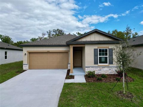 Photo of 10908 Curving Creek Loop, Parrish, FL 34219 (MLS # TB8464987)