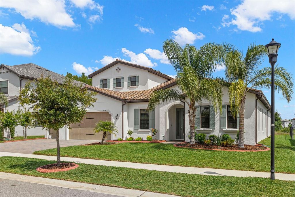 Photo of 6154 Marsh Trail Drive, Odessa, FL 33556 (MLS # TB8388444)