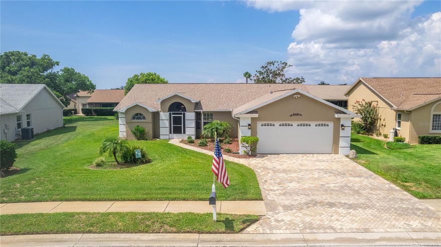 FHA appraised at $304,000! Back on Market due to Buyers inability to close.  Welcome to this fantastic 3 bedroom 2 bath 2 car garage home in the desirable community of The Estates of Beacon Woods.  Coming up to this home is an inviting pavered driveway and walkway.  The outside has been freshly painted.  The entrance is covered and screened with double doors into the the light ad bright living room.  This is a 2 way split bedroom plan with the main bedroom and bath to the left.  There are sliders to the backyard from the main bedroom.  The bath has a large walk in closet.  The living and dining room has cathedral ceilings and another set of sliders to the back lanai.  Beyond is the kitchen with a spacious eat in area with bay windows for those casual meals.  The second and 3rd bedroom are done the hall from the kitchen and share a large 2nd bathroom.  You walk through the laundry room to enter the 2 car garage,  The backyard has an excellent screened and covered lanai to enjoy the Florida seasons.  The Estates of Beacon Woods is minutes from a public library and local hospital.  Located about 10 minutes from SunWest Beach and Park and 45 minutes to Tampa Airport.