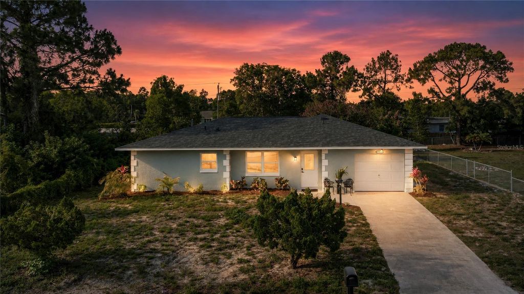 Photo of 4211 5th Street W, Lehigh Acres, FL 33971 (MLS # TB8512916)