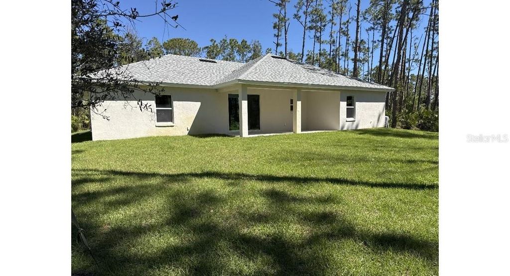 Photo of 2137 Kamsler Avenue, North Port, FL 34286 (MLS # OM717122)