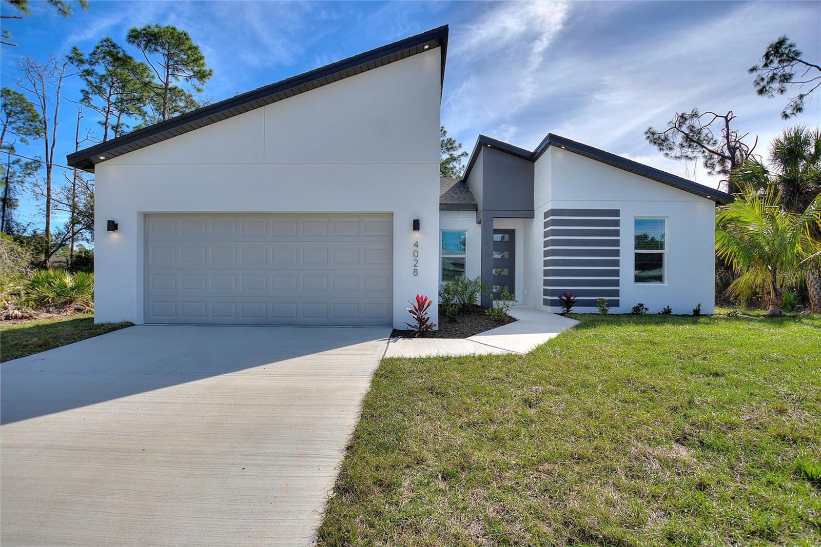 Be one of the first to move into this BRAND NEW HOME, single family home with a 2 car garage and plenty of yard space for you and your family (and pets, if you have them!). This property is brand new and includes unbelievably MODERN finishes and amenities that you will not find at any other rental property! Stainless steel appliances, QUARTZ countertops, 2” blinds, 100% tile flooring throughout, and luxury finishes just to name a few! With the LED lighting and ENERGY EFFICIENT doors & windows package, it is sure to help out your pocket book with utility costs! One-Time - Admin fee:$125, Monthly Fee - Pet fee: $25. YOU WILL NOT FIND A BETTER FEELING HOME FOR YOU AND YOUR FAMILY TO MOVE TO. WE ARE PET FRIENDLY! HURRY UP & APPLY TODAY! (photos may not be exact - only an example of finishes and floor plan)