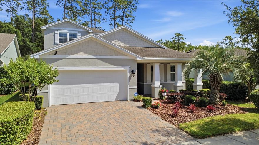 One or more photo(s) has been virtually staged. Welcome to this stunning, model-like two-story Kolter home located in the highly sought-after Victoria Hills community in beautiful DeLand! Offering 3 bedrooms, 3 full bathrooms, built in 2017 and an incredible layout, this home features approximately 2,828 square feet of thoughtfully designed living space with a private upstairs in-law suite—perfect for multi-generational living or guests. Open floorplan to present formal dining and living areas. From the moment you arrive, you’ll notice the beautiful curb appeal with a pavered driveway, lush landscaping, and inviting front porch—perfect for enjoying the Florida sunshine. Step inside to discover a light and bright open floor plan loaded with upgrades, including plank tile flooring throughout the main living areas, crown molding, tray ceilings, 5-inch baseboards, 8-foot doors, and plantation shutters and built in cornices.

The gourmet kitchen is truly the heart of the home, featuring granite countertops, a large breakfast bar, decorative backsplash, farm sink, maple cabinetry with abundant storage, walk-in pantry, built-in desk, recessed and LED lighting, and a gas range with convection oven—perfect for any home chef. There are even two microwaves—one in the main kitchen and another in the upstairs suite. The spacious dining and living areas flow seamlessly and open through a stunning 16-foot sliding glass door with a built in remote control shade to the oversized screened lanai.

Enjoy outdoor living at its finest with a 24x11 pavered screened lanai, complete with a bump-out area ideal for a hot tub or soaking up the Florida sunshine. The home backs up to a serene conservation and greenbelt area, offering privacy with no rear neighbors.

The downstairs primary suite is spacious and luxurious, featuring dual vanities, tray ceiling, a makeup vanity, large walk-in shower, private water closet, and generous walk-in closets. A split floor plan offers a second bedroom and full guest bath on the main level, along with a dedicated office and convenient inside laundry room to include washer and dryer with built in cabinets, utility sink and folding station.

Upstairs, you’ll find a fantastic in-law suite with a Acorn Chair lift access, with its own open living area  kitchenette, bedroom, and full bath—providing comfort and flexibility for extended family or guests. Additional features include two HVAC systems with maintenance plans, gas dryer, high-speed fiber optic internet, transferable termite bond with in-wall pest control system, and security cameras that convey.

Built with solid block and stucco construction from the first to second floor, this home is both durable and energy efficient—and truly move-in ready with upgrades already done. Why wait to build when you can have it all now?

Victoria Hills offers resort-style living with a low HOA of $215/month, which includes internet and cable, plus access to multiple pools, fitness centers, tennis and pickleball courts, parks, walking trails, lakes, and an 18-hole golf course. The community also features a clubhouse with restaurant and bar, all surrounded by 458 acres of preserved land.

Conveniently located just minutes from Publix, medical facilities, and charming historic downtown DeLand with its boutiques and dining, and with easy access to I-4, SunRail, Orlando, Daytona Beach, and the Amazon fulfillment center—this location truly has it all.
Be sure to check out the 3D tour! This home won't last long. Call today.