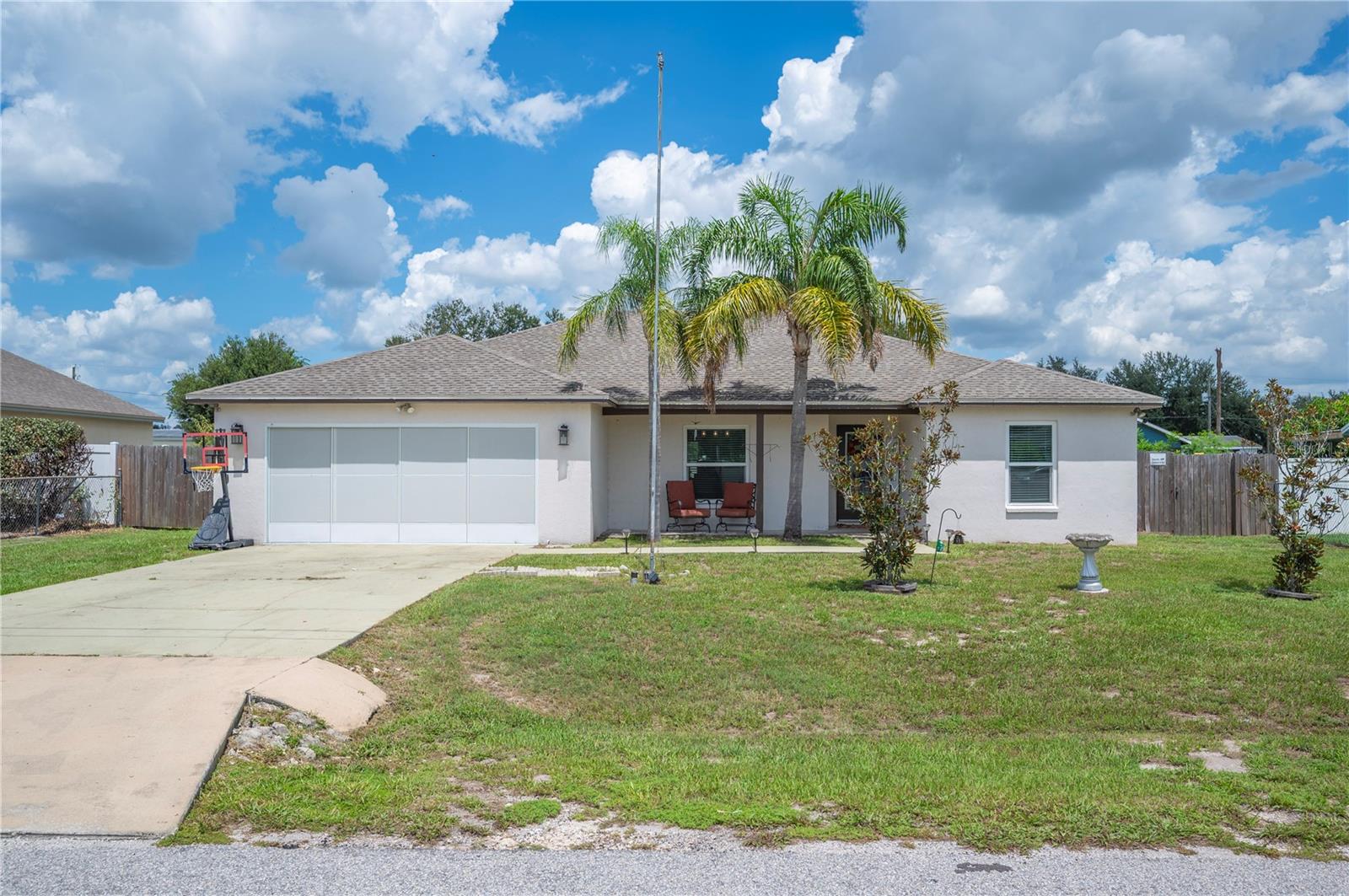 Looking for a spacious 3/2 block home without breaking the bank? Look no further! Check out this beautiful home located in Mulberry Fl just off of Hwy 60 making traveling to Plant City, Bartow, Lakeland, & Brandon a breeze! As you enter you are greeted by a large open living space with high vaulted ceilings overlooking a large dining area and kitchen! This split floorplan is ideal for families or for your out of town guests! Features include beautiful luxury vinyl plank flooring throughout the entire home, New roof 2021, New drain field 2024, new interior and exterior paint 2022, new flooring 2022, new sliding doors 2025, and newly enclosed Florida room! Enjoy those FL afternoons in your fenced in back yard and sparkling above ground pool! Located in a very low HOA neighborhood and close to schools, grocery stores, and more! Schedule your showing today!
