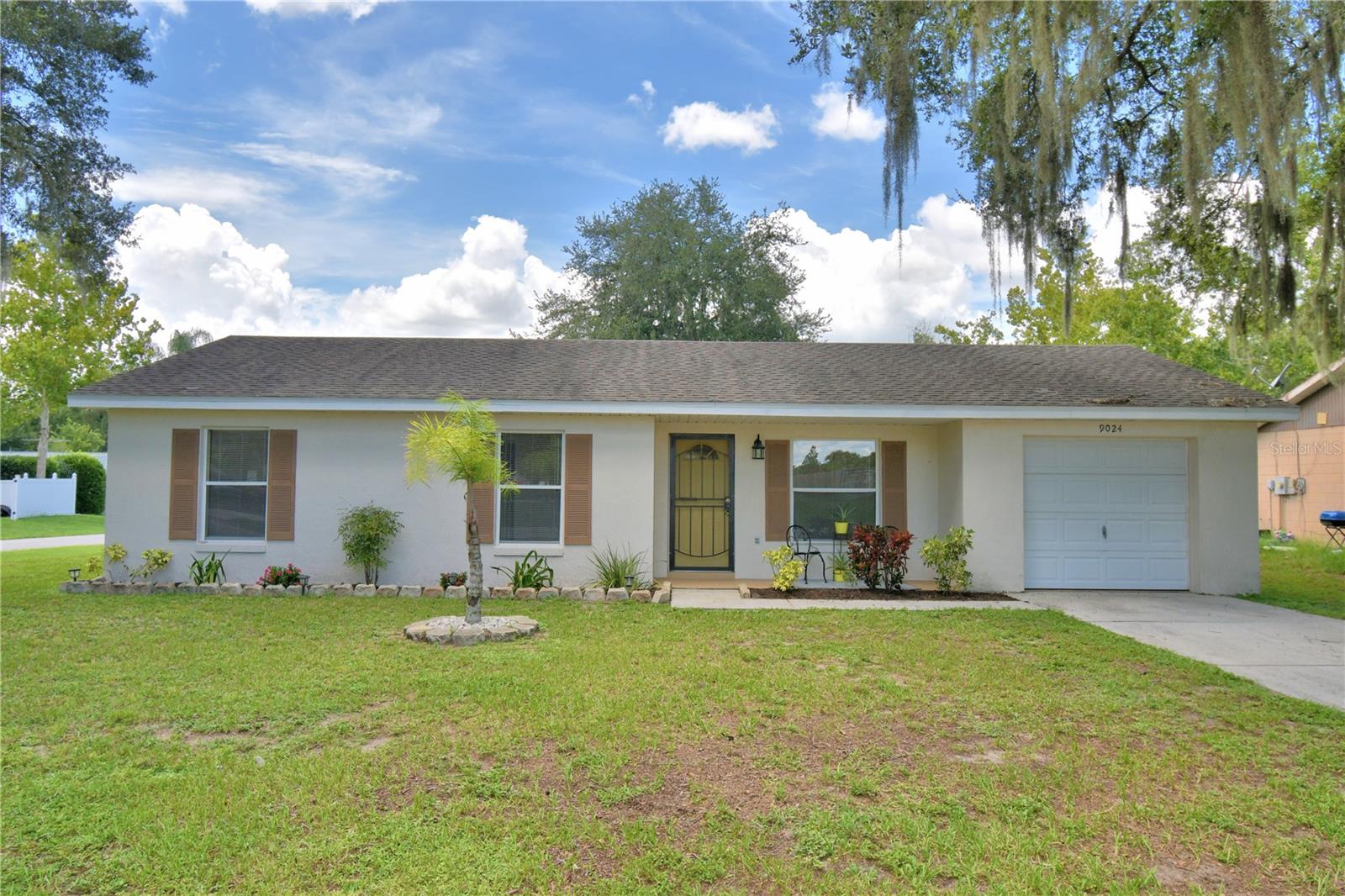 Are you looking to downsize or a starter home? Look no more!!!!! This cozy home offers three bedroom, one bathroom on a large corner lot with spacious back yard. This home features freshly painted interior, updated bathroom, and laminate flooring. The living room is open concept with dining room and kitchen. The kitchen is situated next to the dining area and features ample wood cabinets and Formica countertops. The covered-screened back porch provides ample space for family gatherings, grilling and relaxation. Added bonus, no HOA community. Conveniently located near I-4 with access to Polk Parkway and Route 33 providing easy access to Orlando, Tampa and local attractions and amenities. Don't miss out on this home.....Call today for an appointment.