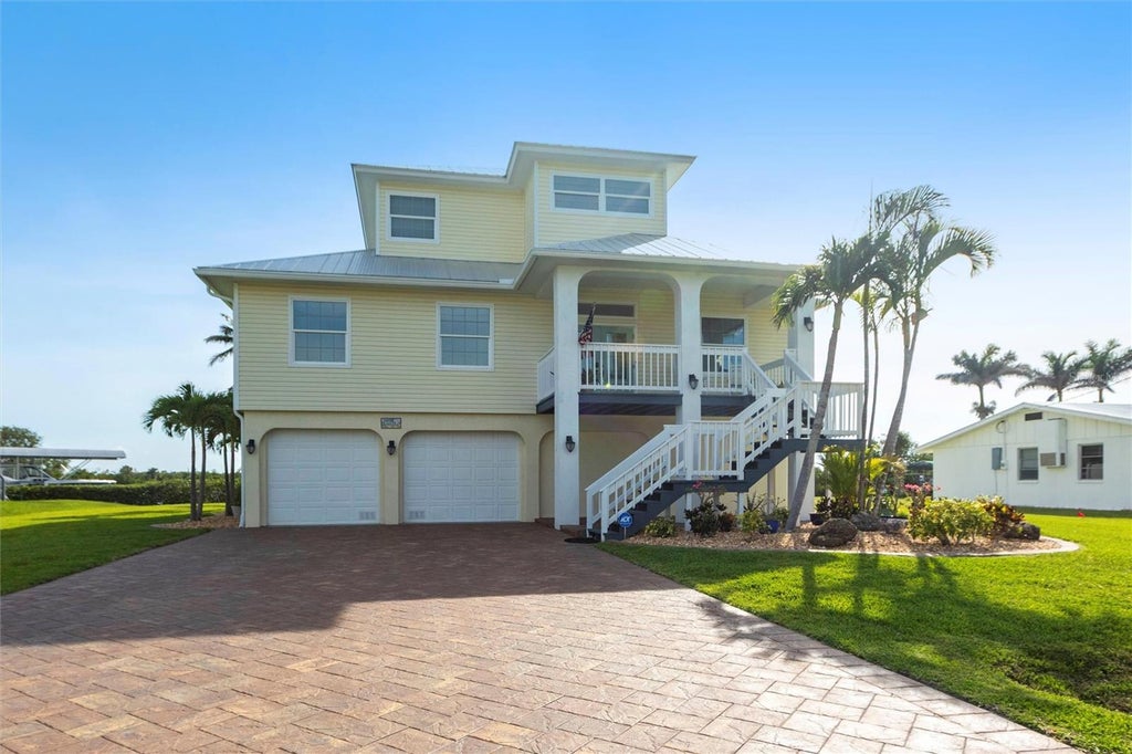 Photo of 24197 Treasure Island Boulevard, Punta Gorda, FL 33955 (MLS # TB8558039)