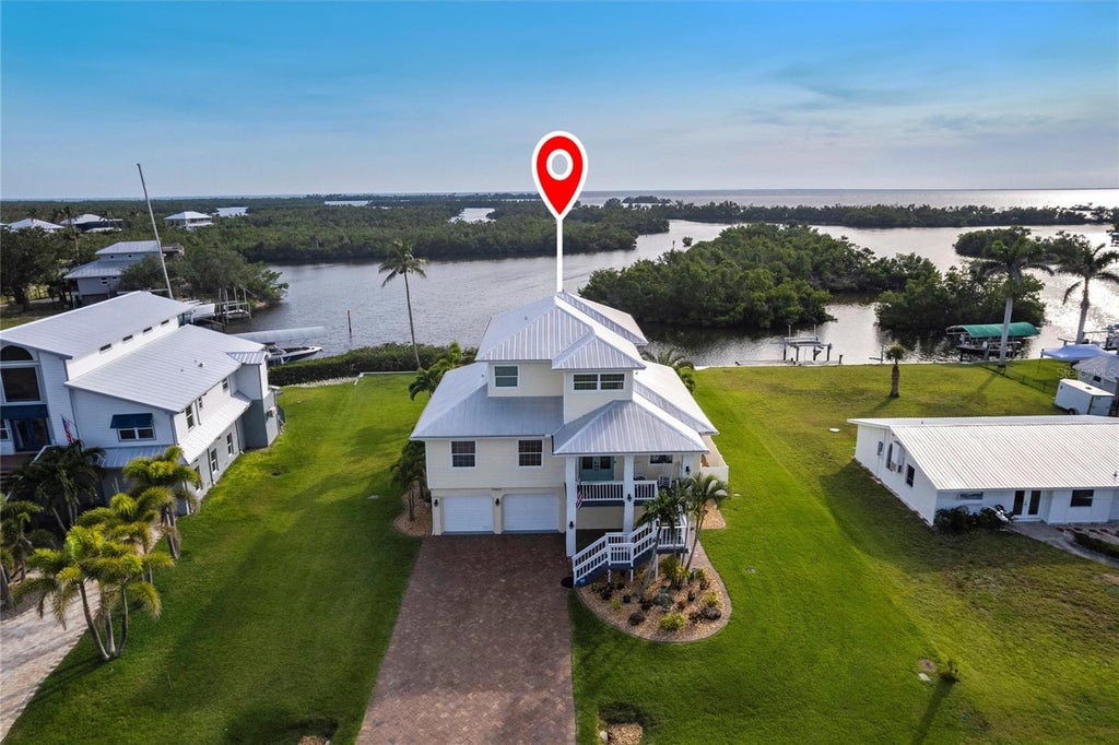 Photo of 24197 Treasure Island Boulevard, Punta Gorda, FL 33955 (MLS # TB8558039)