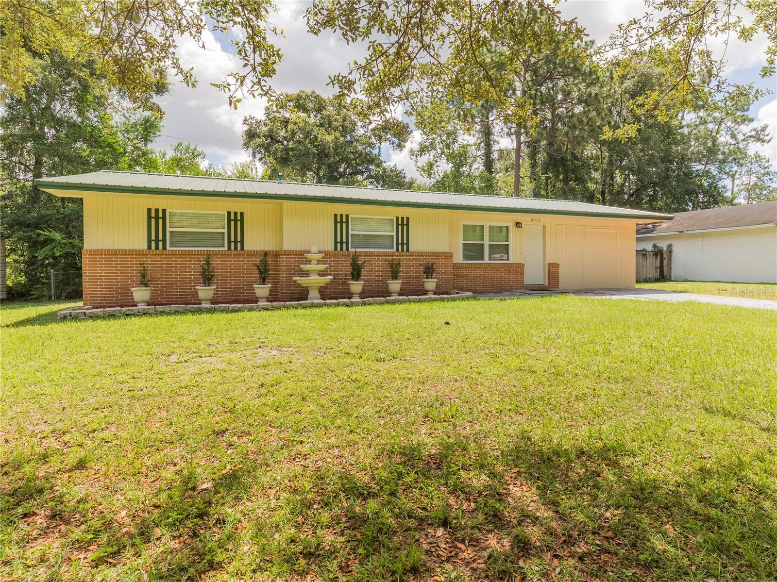 Adorable 3 bedroom home in the desirable NW, right off of 39th and Close to Shopping and entertainment. This Home has everything from modern vinyl plank floors to updated kitchen and bathroom, newer AC, newer appliances and more! The home also has a spacious fenced back yard with shed. Pets welcome.