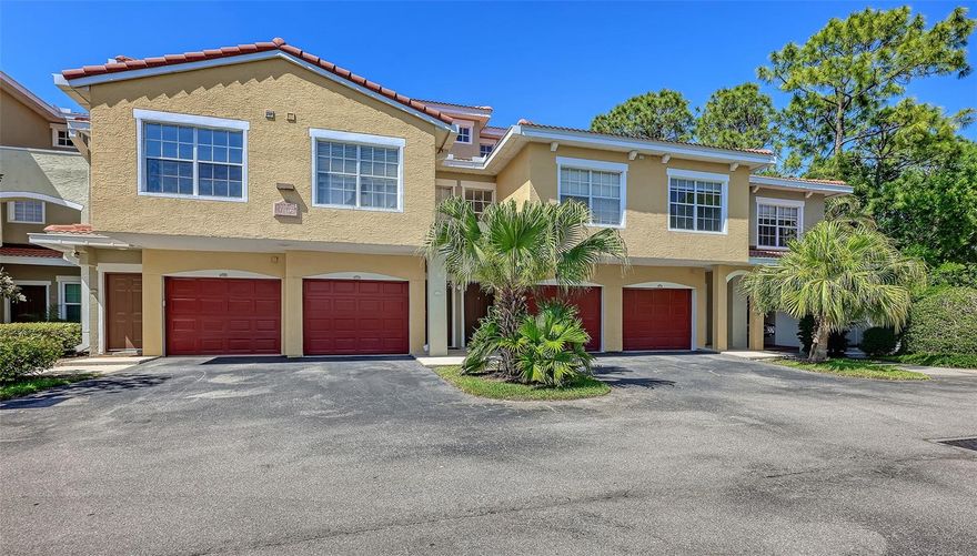 One of the most spectacular renovations in all of Las Palmas is now available. This unit has been meticulously and professionally redone in 2024; designed to appeal to the discerning buyer.  Beautiful tile floors throughout greet you when you first enter this three-story townhouse.  Up one flight of stairs brings you to the heart of the home.  A beautiful and tasteful kitchen with solid wood cabinets, granite counter tops, stainless appliances and a tile backsplash.  The kitchen has an open feel and flows seamlessly into the family room.  A generous dining area completes this special space.  From the family room, you can step out onto your private balcony, recently sealed and rescreened with screening meant to keep out the bugs.  The view of the serene lake is a sight to behold.  On this level there is also a bedroom, and full bath which underwent a total renovation.  Up another flight of stairs brings you to the main bedroom, with a spa like renovated main bathroom and walk in closet.  Another bedroom on this level can be utilized with endless possibilities.  The closet contains custom shelving.  The washer and dryer are also on this level making laundry day a breeze.  All the doors have been replaced and repainted, all the railings have been repainted as well.  Add these to the total interior painting and this wonderful unit is move in ready. A private one car garage, new impact windows on the third floor and a NEW ROOF make this unit a must see.  Come live the dream.