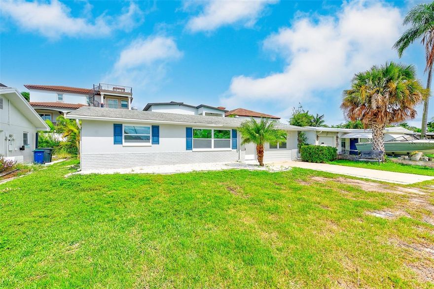 Welcome to your beautifully remodeled 3-bedroom, 2-bath bungalow, thoughtfully updated with brand-new appliances and stylish flooring throughout. Light-filled and inviting, this home offers the perfect blend of modern comfort and coastal charm. Ideally located just across the street from a waterfront park and a short stroll to the beach, which has just completed a brand-new sand renourishment project, you’ll enjoy the best of Florida’s Gulf Coast lifestyle right at your doorstep. The newly renovated historic Beach Theatre is also just moments away, offering a classic local venue for movies and community events. The spacious backyard is perfect for entertaining family and friends or simply relaxing in the sunshine. Enjoy convenient access to shopping, recreation, and local restaurants. Just 3 miles away, lively John’s Pass offers endless activities: charter fishing, jet skiing, sailing, dining, live music, and boutique shopping. For effortless exploration, hop aboard the Suncoast Beach Trolley, which connects you to all of the Gulf beaches, from Clearwater Beach down to historic Pass-a-Grille. With stops every 20–30 minutes and service running into the evening, your coastal adventures are only a ride away. Whether you’re soaking up sunsets, enjoying festivals and live music, or exploring iconic destinations like the Don CeSar or Clearwater Marine Aquarium, this home places you at the heart of it all.