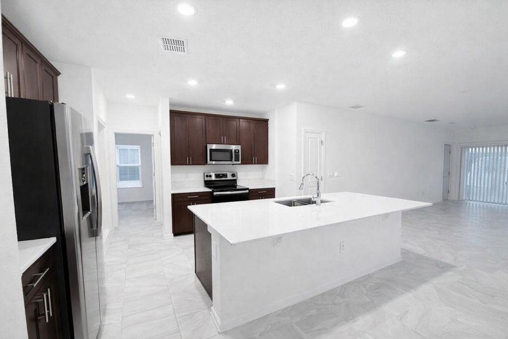 Photo of 558 Jett Lane, Davenport, FL 33837 (MLS # S5144007)