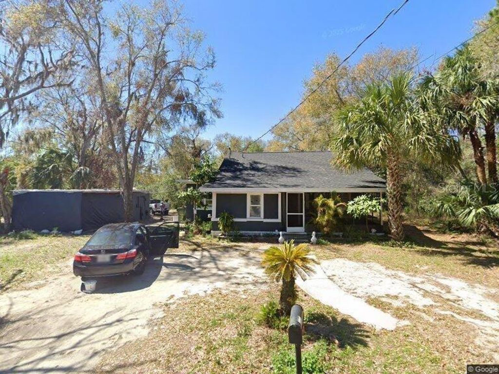 Photo of 1121 Lucas Street, Leesburg, FL 34748 (MLS # O6350068)