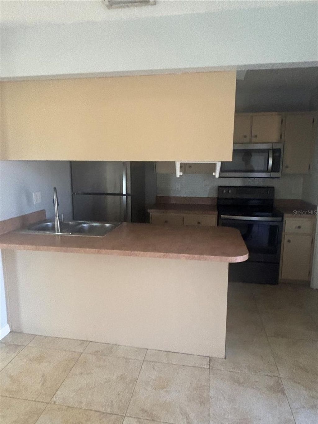 Photo of 327 E Dundee Drive, Poinciana, FL 34759 (MLS # O6376281)