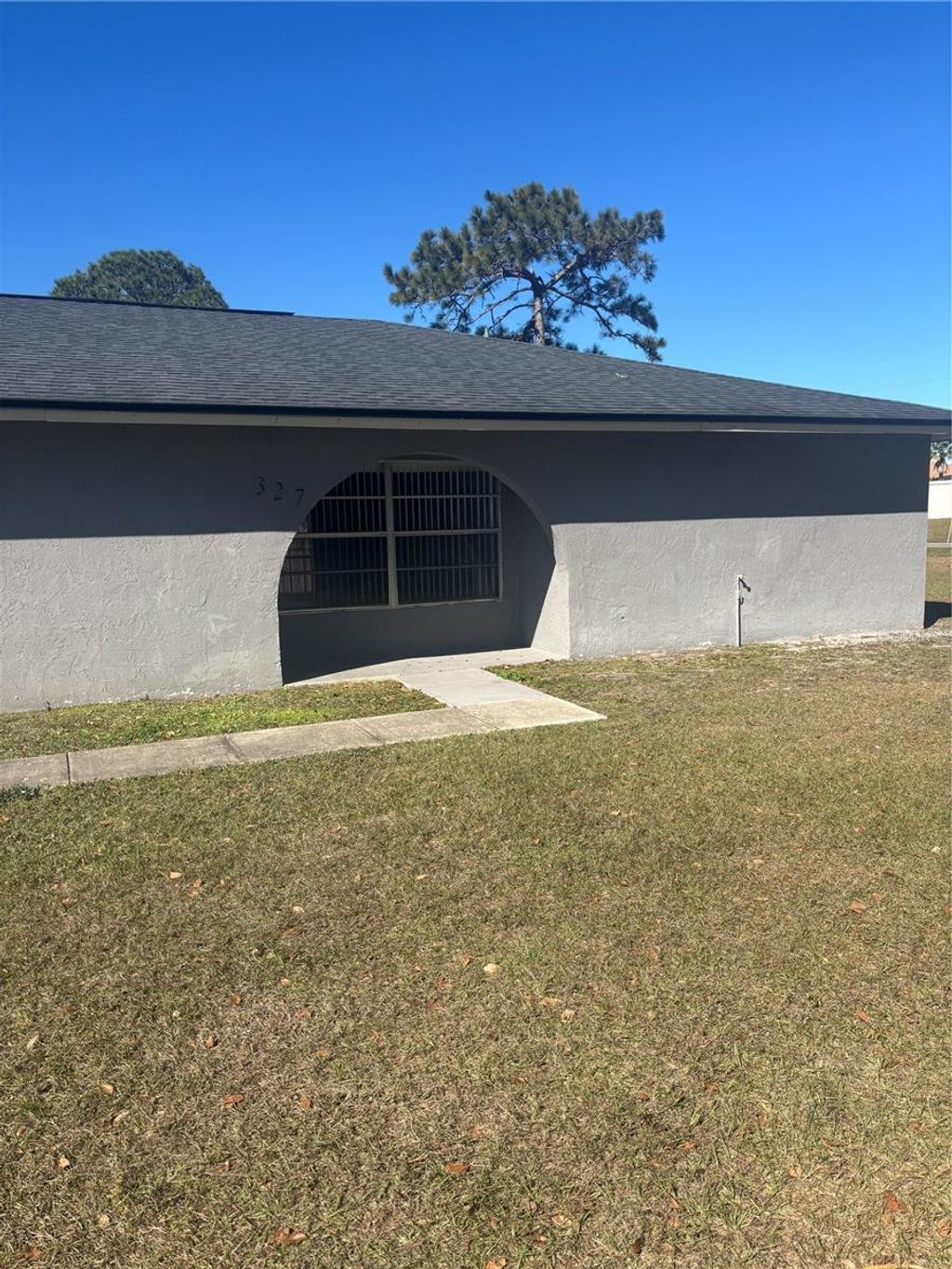 Photo of 327 E Dundee Drive, Poinciana, FL 34759 (MLS # O6376281)