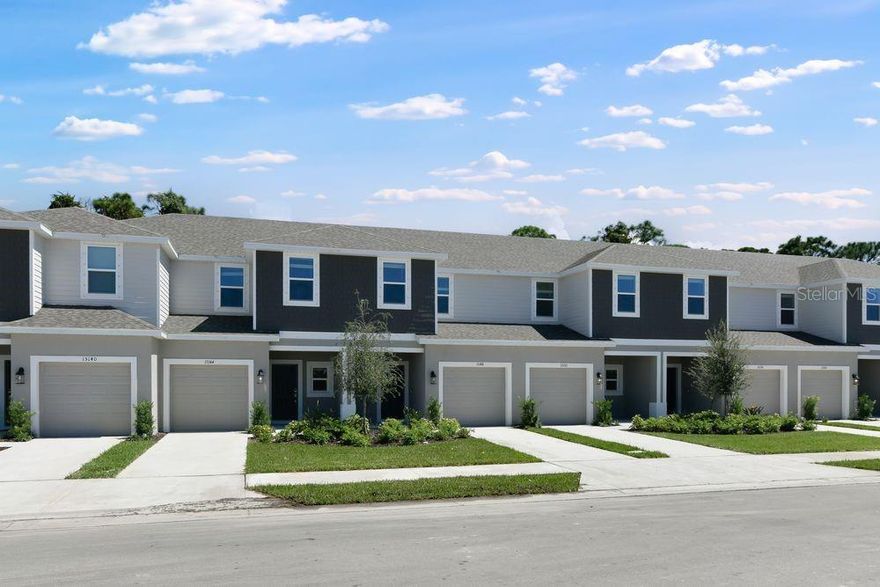 New Construction - Ready Now! Built by Taylor Morrison, America's Most Trusted Homebuilder. Welcome to the Jasmine at 15148 Cuzcorro Court in Vinterra Townhomes. With 3 inviting bedrooms, 2.5 sparkling baths, and a super-convenient one-car garage, this home is built for easy living and everyday joy. Start your tour on the cozy front porch, then step inside to a bright and breezy great room that flows right into a modern kitchen—complete with a large island that’s practically begging for brunches, bake-offs, or midnight snacks. The main level also features a sleek half bath, garage access, and a spacious patio that’s perfect for BBQs, hammock hangs, or simply soaking in the sun. Head upstairs to discover two comfy bedrooms and a full bath—plus the star of the show: your dreamy master suite. Think roomy walk-in closet, double vanity, and spa-like vibes all around. And yep, the laundry area is up here too, right where you need it!  Storage? Oh yeah—we’re talking under-stair hideaways, a generous pantry, a linen closet, and big closets in every bedroom. Outside your door, find a pool, cabanas, dog park, butterfly garden and access to the 18-mile Legacy Trail with walking and biking paths. Nokomis Beach, Casey Key and Siesta Key are less than 5 miles away. Or head to Oscar Scherer State Park to kayak, fish, swim and picnic. Pine View School is close by. A sun-soaked lifestyle awaits—reach out and grab it!  Additional Highlights Include: all appliances and whole house blinds. MLS#A4651442