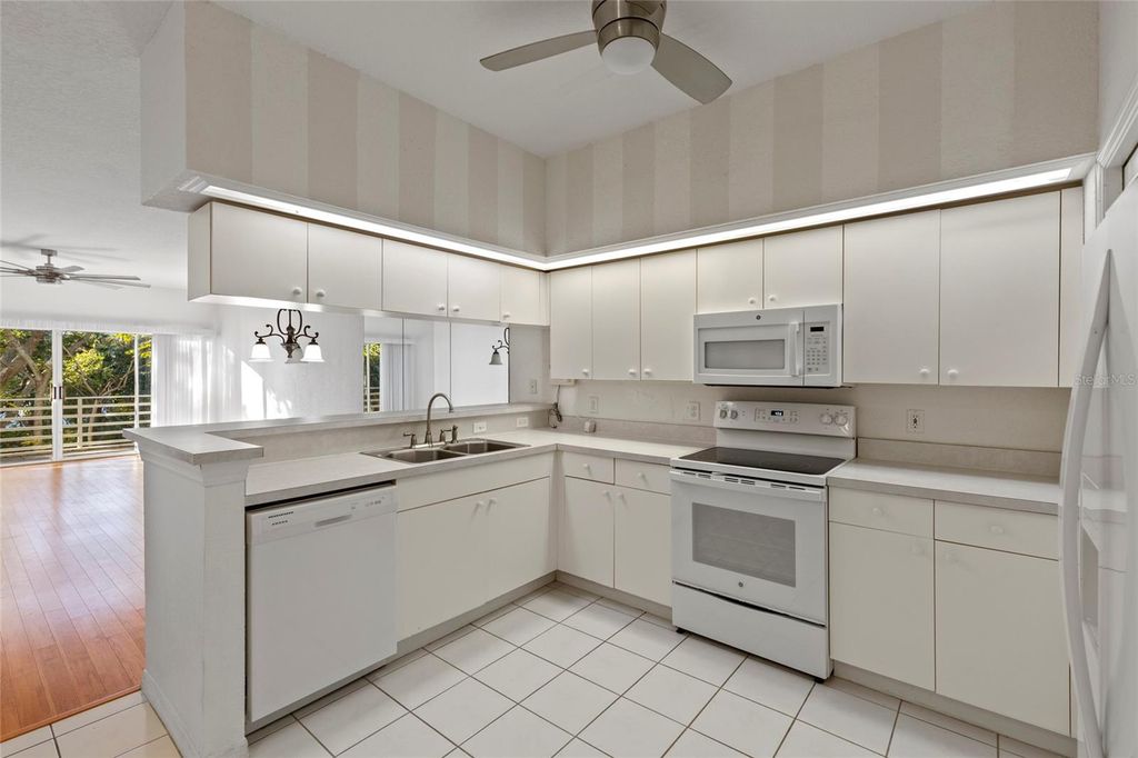 Photo of 4610 Mirabella Court, St Pete Beach, FL 33706 (MLS # A4679113)