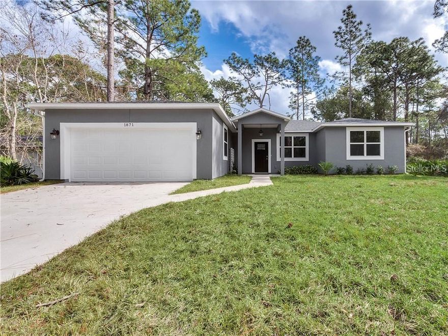 Deland 3 Bedroom 2 Bath Custom Built Home - Built in 2020 l lots of upgrades l move in ready l private lot! This beautiful property is a MUST SEE! 3 bedrooms, 2 bathrooms with 1,796 sq ft on a .26 acre lot. The family room/kitchen combo is spacious and bright thanks to all the windows and sliding glass door that leads to the covered screened in porch and private backyard. The kitchen is AMAZING! Large center island w/bar stool seating, stainless steel appliances, decorative back splash and great color combos. The breakfast area has plenty of space for a large table. Barn doors lead to the utility room and large walk in pantry. The master suite features a large walk in closet and spa like master bathroom. The bathroom boasts his and her vanity, garden tub and huge walk in shower. Additional bedrooms are spacious and share a beautiful guest bathroom. The back covered porch is perfect for morning coffee or evening dinners. The backyard has plenty of room for everyone including the pets! Reverse Osmosis water system installed along with a Water Softener. Don't wait! Make your appointment today to see all this property has to offer for YOU! More pictures coming.. All information is deemed to be correct but not guaranteed.