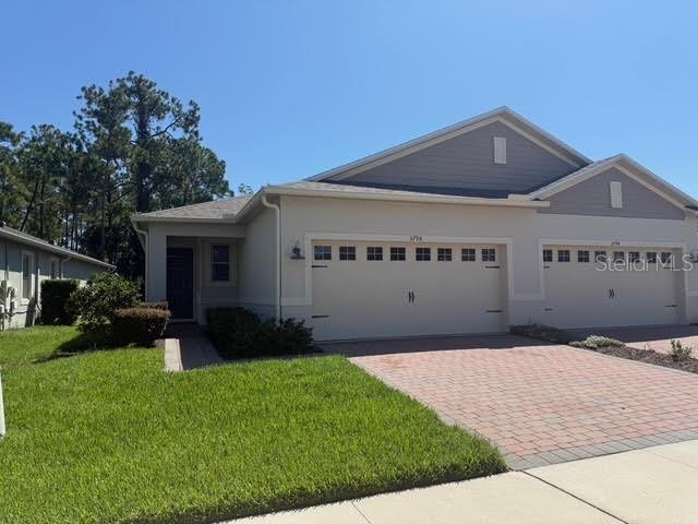 This 2 bedroom home has had a full makeover - New paint throughout and brand new carpets. Located in the 55+ premier community of the Palms at Serenoa, this gated community is a quiet oasis off Sawgrass Blvd which will eventually be joined to Western way for quick commuting to Orange county and Disney. The property is located in a Cul de sac complete with a dog park and pond. The townhomes are attached to one property only and backs onto conservation land. The single story home has tile throughout the living area leading to a screened porch and some wall features have been added to the living space, the entrance opens to a foyer with an office / flex space also tiled then an open plan kitchen living area with two bedrooms and two bathrooms. The home also benefits from a water softener system. Priced for. quick sale don't delay your viewing today.