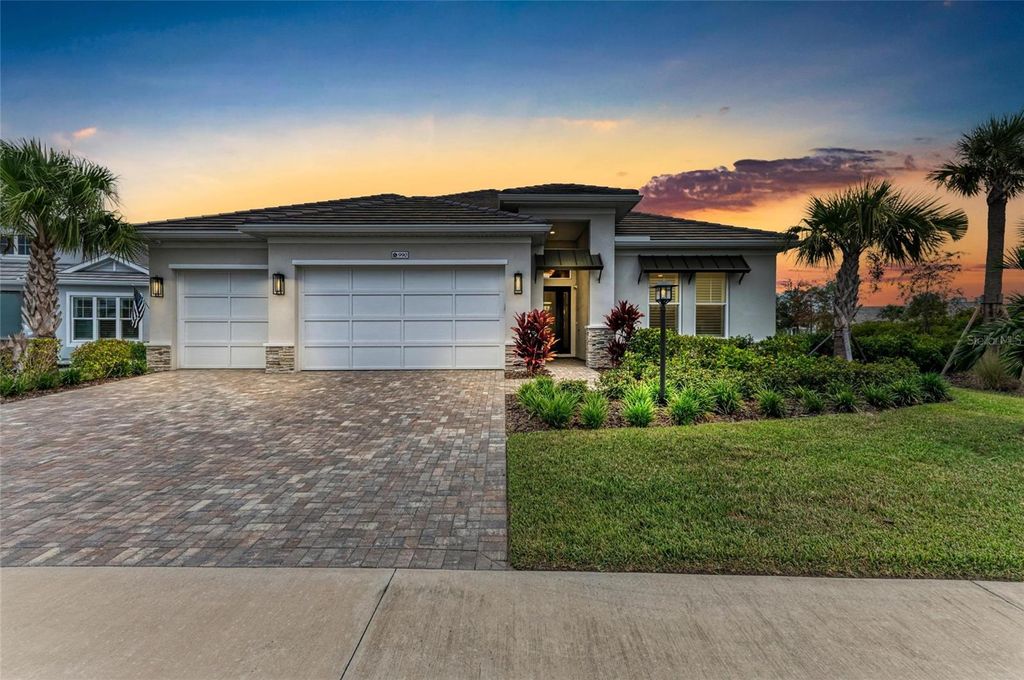 Photo of 990 Seascape Place, Sarasota, FL 34240 (MLS # A4666039)