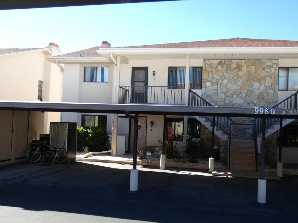 2nd Floor, Block Condo, 2 Bedrooms, 2 Bathrooms, Move in Ready, Vaulted Ceiling, Wood Burning Fireplace, Washer & Dryer, Comes Completely Furnished, Storage Room Down Stairs, All this in a Clean Community that has a Community Pool, Club House, Fitness Room, a storage rack for Kayaks and a Floating Dock with Access to the Gulf of Mexico. This condo is centrally located near shops, restaurants, beaches, county park and more. Less than 45 minutes to St. Pete Beach in Florida was just named The #1 Beach in America and the Fifth Best Beach in The World. Please view two videos: Tour 1 & Tour 2