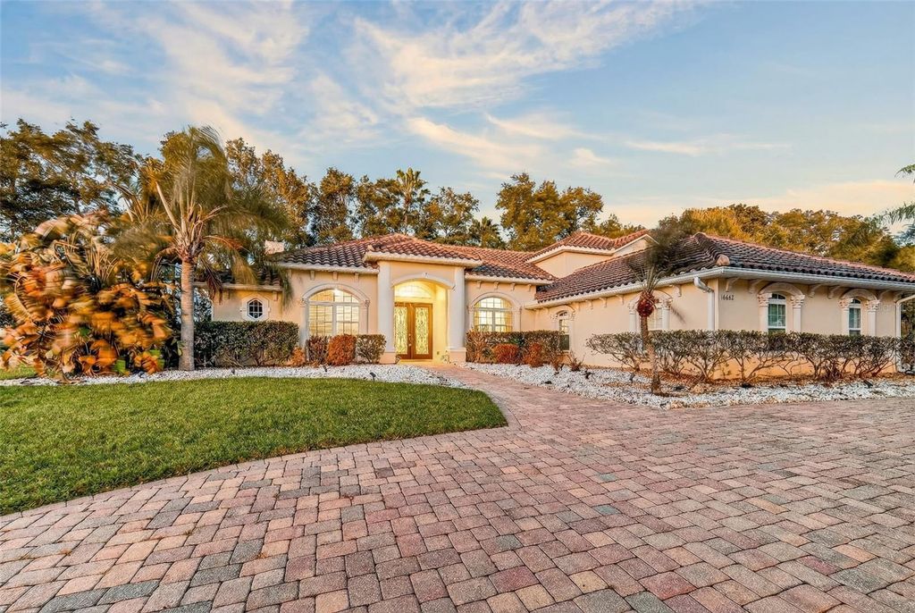 Photo of 16623 Royal Palm Drive, Groveland, FL 34736 (MLS # O6380686)