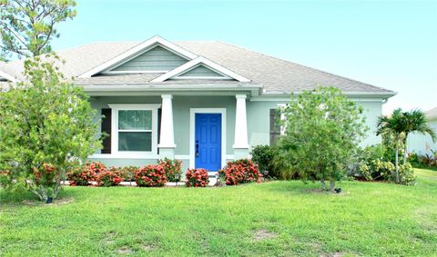 Photo of 443 Biscayne Ave NW, Palm Bay, FL 32907 (MLS # O6339923)