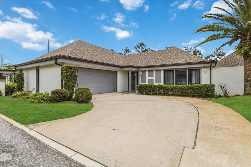 Rarely available and full of value, this spacious villa-style condominium offers the comfort of a single-family home with the ease of low-maintenance living. With over 1,800 square feet, 3 bedrooms, 2 bathrooms, and a large attached 2-car garage, this is a unique opportunity for buyers looking for space, privacy, and major updates in a prime location. From the moment you arrive, you’ll notice the attractive curb appeal and the charm of being in a established community. Inside, the bright and open floor plan welcomes you with a spacious great room featuring NEW flooring, creating the perfect setting for both relaxing and entertaining. The updated kitchen is designed for both style and functionality, featuring NEW cabinets, NEW countertops, counter seating, a walk-in pantry, and a versatile bonus nook that can serve as a breakfast area, home office, or additional dining space. The formal dining area and expansive living spaces create a seamless flow throughout the home. The primary suite serves as a private retreat with a large bedroom, walk-in closet, and en-suite bathroom featuring a beautifully tiled walk-in shower. Two additional bedrooms are generously sized with ample closet space and share a well-appointed secondary bath. One of the most impressive features of this home is the oversized private screened and fenced backyard oasis—a rare find for condo living. With direct access from the kitchen bonus room, primary bedroom, and secondary bedroom, this outdoor retreat is ideal for morning coffee, relaxing evenings, entertaining guests, or simply enjoying your own peaceful outdoor space. This home is packed with valuable updates, including a NEW ROOF, NEW GUTTERS, updated plumbing, updated electrical throughout, and fresh modern finishes that make it truly move-in ready. Residents enjoy a peaceful, active, and low-maintenance lifestyle with access to a community pool and clubhouse, perfect for social gatherings and recreation. The HOA provides exceptional value by covering exterior structure maintenance including roof and exterior paint through the master insurance policy, landscaping, clubhouse, and pool maintenance. The location is another major highlight—conveniently situated near world-class shopping, dining, golf, and major attractions, with easy access to major highways for commuting throughout Central Florida. You’ll also love being just minutes from the highly anticipated new H Mart shopping center, bringing even more dining, specialty shopping, and convenience right to your doorstep. If you’ve been searching for a move-in-ready home with the feel of a single-family residence, private outdoor living, low-maintenance ownership, and an unbeatable location, this one checks every box. Schedule your private showing today!