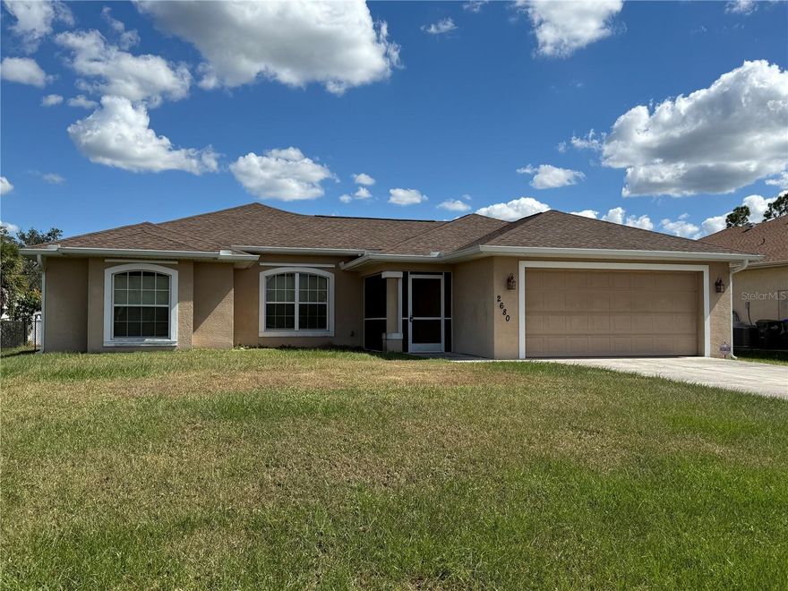 WOW!!! LOOK AT THE PICTURES!!!! Incredibly Rehabbed home in great area. Great location near school. New Specialty Vinyl Flooring Installed in all four bedrooms.  Home just completely painted inside.  This home boasts 4 bedroom 2 bath home with 4th bedroom can be used as an office. Open concept home with split bedrooms and a large screened lanai and vaulted ceilings. The home offers an office with built-in shelving as well as a huge outdoor shed/workshop with AC. The workshop is 10 x 20, insulated, with a wall mount AC unit , 60 AMP electrical service and a large workbench for the handy person in the household. Close to beaches, shopping, highways. A great opertunity for any handy person that needs extra storage. A must see. One owner is a licensed real estate broker in state of Florida.