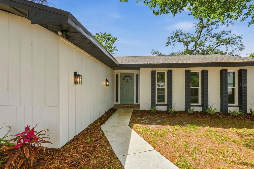 Photo of 9516 Merrimoor Boulevard, Seminole, FL 33777 (MLS # TB8497444)