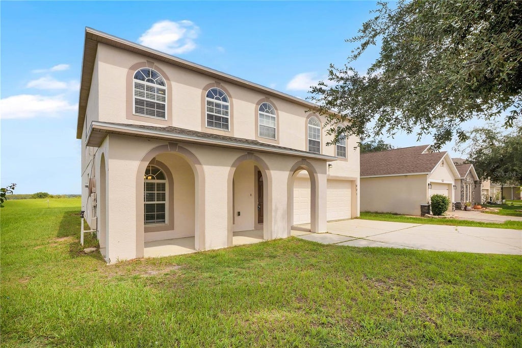 Photo of 401 Blake Avenue, Davenport, FL 33897 (MLS # O6442778)