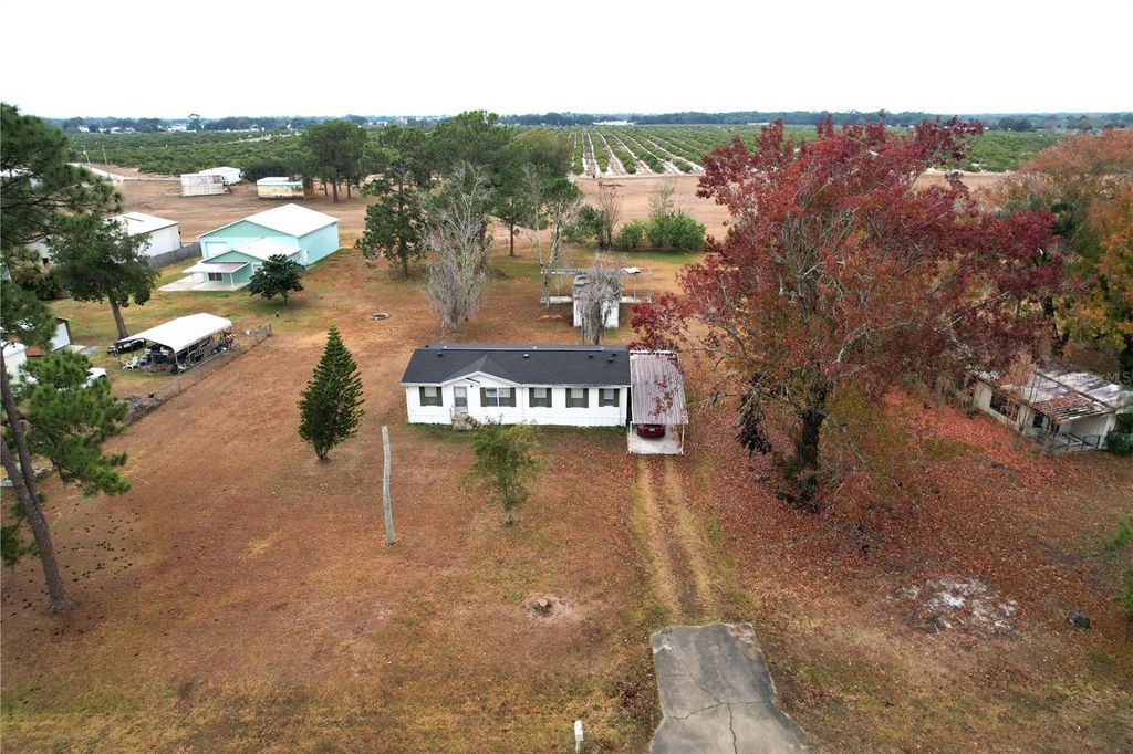 Photo of 112 Pine Tree Drive, Lake Placid, FL 33852 (MLS # O6378287)