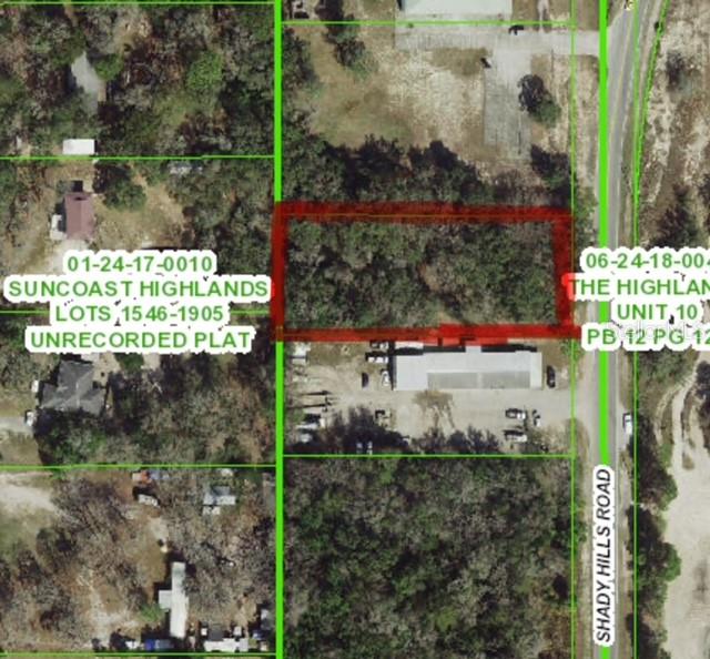 Not many parcels left like this one! Formerly retail, office, residential (ROR). Pasco county rezoned this .88 acre lot to C2 Commercial. Located in a major commercial and traffic corrido. Lots of drive by potential customers, possibly enough new drive by business to pay for itself! Take your pick as to what business you'd like to open. A car sales/repair shop, storage or fast food? You could even build your dream home behind your business! Whatever your choice is it is surely to succeed on this favored commuting route to work or entertainment in the Tampa Bay Area. Easy commute anywhere in the Tampa Bay area or Hernando and Pasco counties. Walking distance to Publix, Hospital, McDonalds, Taco Bell, Walgreens, Circle K and a soon to be built Wendy's and Culver's. Get in on the action before it's too late!