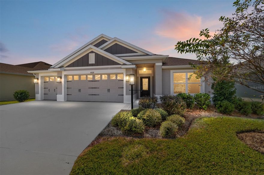 This STUNNING 3/3 Linden Designer home is situated on an oversized lot (ROOM FOR A POOL) with a WATER view and an Oversized TWO CAR + GOLF CART GARAGE located in the desirable Village of DeLuna. From the moment you arrive, the exceptional curb appeal and meticulous landscaping set the tone for what awaits inside. Step through the front door into a BRIGHT foyer and discover over 1,900 square feet of thoughtfully designed living space featuring an OPEN floor plan, HIGH CEILINGS, and an effortless flow between the living, dining, and kitchen areas, perfect for both everyday living and entertaining.  With THREE SEPARATE bedrooms and bathrooms, there’s plenty of PRIVATE space for guests! Throughout the entire home, you will find gorgeous TILE floors, MODERN fans and light fixtures, and five-panel doors. The chef-inspired kitchen features an EXPANSIVE center ISLAND with a FARMHOUSE sink and counter seating, QUARTZ countertops, 42-inch-tall custom cabinetry with pull-outs, under-cabinet lighting, a sleek TILE backsplash, and pendant lighting that highlights the large island, with an adjacent dining room. 
 The primary bedroom features VAULTED ceilings and a large custom-designed WALK-IN closet. Its en-suite bathroom offers QUARTZ countertops, DOUBLE sinks, TILED ROMAN WALK-IN shower, and a private water closet. Just off the foyer, there is a pocket door that SEPARATES the second bedroom and bathroom. The bedroom has a lovely TRAY ceiling, a built-in closet, and the second bathroom offers a TILE tub/shower with a window, a QUARTZ countertop, and a hallway linen closet. To the rear of the home is another SEPARATE guest wing. Bedroom 3 has a VAULTED ceiling and a built-in closet. The third bathroom features a TILED WALK-IN shower, QUARTZ top, and a LINEN closet. Hidden behind a POCKET DOOR off the kitchen is a home OFFICE with GORGEOUS, BUILT-IN, CUSTOMIZED cabinetry, a DESK area, and a STORAGE closet with custom shelving, and an INTERIOR laundry room with a POCKET door, utility sink, shelving, and additional cabinets. The TRIPLE sliding glass doors with transom windows off the living room open to the GENEROUS covered screened LANAI, which provides the ideal setting to enjoy tranquil pond views and stunning Florida sunsets. Other features include 6" seamless gutters, an insulated garage door with UV-reflective film, an attic access ladder, and a transferable Massey termite protection plan for added peace of mind. Situated on a pool-ready lot, this home is 0.7 miles from the DeLuna Recreation Center & Pool, and just minutes from Brownwood Paddock Square, Everglades Regional Recreation Center, and executive golf courses. Enjoy shopping, dining, entertainment, and recreation, all just a short golf cart ride away. This exceptional property perfectly captures The Villages lifestyle—where elegance meets ease, and every detail says, “Welcome Home.” Bond Balance is $32,756