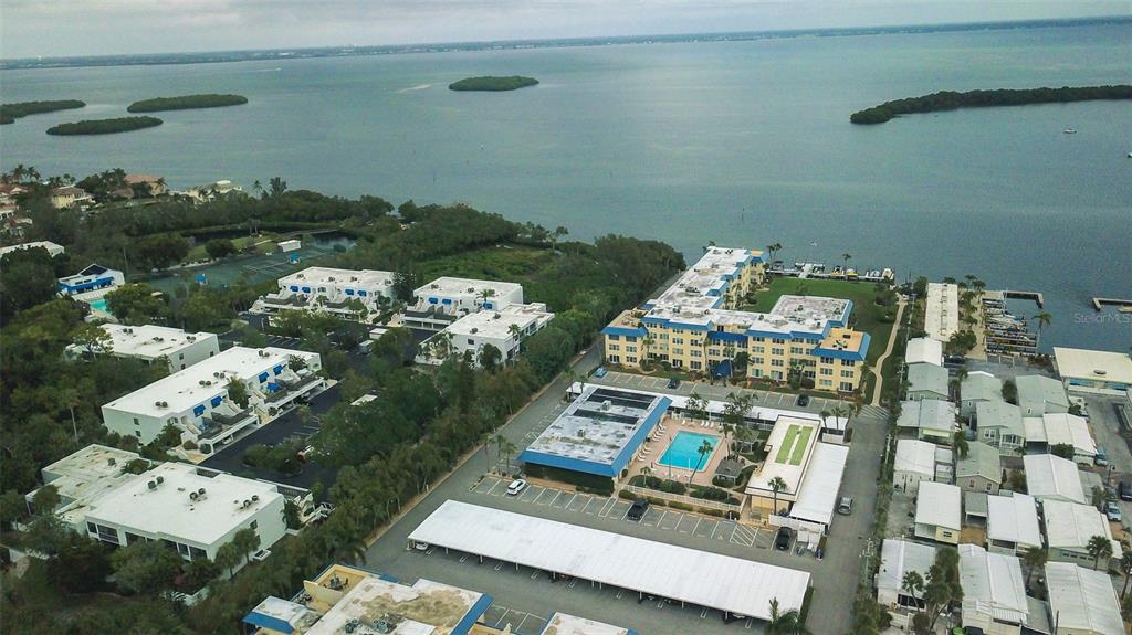 Welcome to Sunset On The Gulf! This gorgeous 2-bedroom, 2-bathroom, third-floor, corner condo offers the perfect location. Located between the bay and the beach, you are bound to have endless adventures. The community of Beach Harbor Club offers resort-style living at its finest. There is a large community pool, a clubhouse with a bar, and a fitness center to get in your morning exercises! You are just across the street from the gorgeous Gulf Beaches, with private beach access. Upon entering this condo, you will see an ocean view from the third floor. As you enter, you will find the large kitchen, which has stainless steel appliances, six barstools, a giant kitchen island, a lounge area with a sofa, and plenty of space to prepare your family’s favorite treats. You will find lovely natural lighting throughout, due to this condo having windows on all four sides. Adjacent is the dining table, with gorgeous West Elm chairs that accommodate up to six. The spacious living room has a sizeable “L” shaped couch, an entertainment center, and beautiful natural lighting through the windows. There are views from the master bedroom and the reading nook in the kitchen area, where you will love to enjoy your morning coffee with the sunshine streaming in those windows. The primary bedroom has a king-size bed, a chair, a TV, and plenty of closet space for your personal belongings. Attached is the primary bathroom, which has a large vanity with a stunning walk-in shower that has exquisite masonry work, and a detachable showerhead. The second bedroom has a queen-size bed and plenty of closet space. The second bathroom has a large vanity with a shower/tub combo. There is community Kayaks with a lift for use by renters, there are two rooftop patios in the building which are shared. The one at the front is perfect for watching the sunset every evening. This condo is a short drive to St. Armands Circle and Downtown Sarasota where there are restaurants, boutiques, shopping, theater, opera, ballet, botanical gardens etc. we are close to many great restaurants. Come see why people come to Longboat Key year after year. There is a dedicated covered parking spot and additional guest parking. House Rule: No smoking. No burning candles inside of lodging. No parties. No Pets.
**Taxes and fees not included.