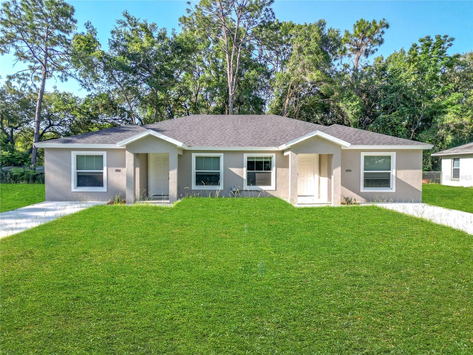 Incredible Investment Opportunity – Brand New Construction & Fully Leased!
Enjoy exclusive investor benefits including interest rates as low as 3.75% through our in-house financing, 2 years of free property management, and 3 years of rental income protection when financing with Southern Impression Homes. Located in a quiet residential neighborhood, the property is in flood zone AE, on a well/septic system, and part of the fast-growing Citrus County market.
Offered by Southern Impression Homes, this turn-key duplex in Inverness, FL is the perfect addition to any investor’s portfolio. With construction completed in 2025, this block-built Build-to-Rent property features two spacious units—Unit 109 rented at $1,365/month and Unit 111 at $1,425/month—providing immediate cash flow and strong rental history. Each unit offers 2 bedrooms and 2 bathrooms, totaling 4 beds, 4 baths, and 2,104 sq ft of living space. All dimensions are approximate. Photos and virtual tours are for illustrative purposes only and may not reflect the exact home. Garage orientation and floor plan may vary. Contact us today to learn more!