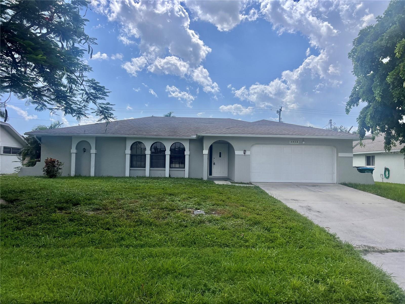 Discover this charming 3-bedroom, 2-bathroom pool home nestled in the heart of Cape Coral. Perfect for enjoying Florida’s sunny lifestyle, this home features a screened-in private pool, spacious lanai, and open-concept living area ideal for entertaining. The split-bedroom floor plan offers privacy for the primary suite, while the other bedrooms are perfect for guests or a home office. Located in a quiet neighborhood with convenient access to shopping, dining, and beautiful Gulf Coast beaches, this Cape Coral gem blends comfort and convenience in a tropical setting.