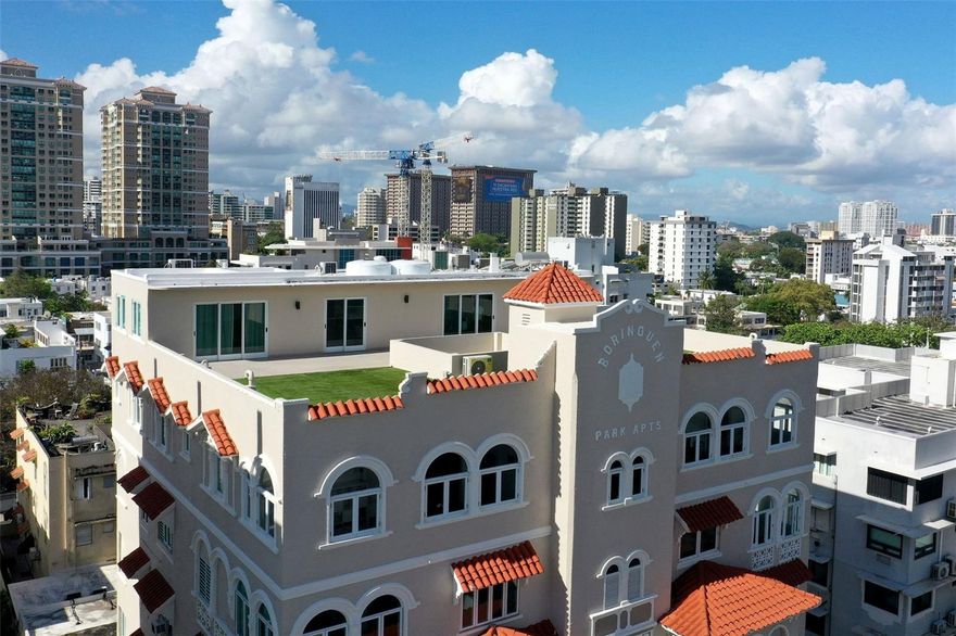 Nestled within Cond. Borinquen Park, a classical building in Condado, Puerto Rico, this 5,200 sq. ft. one-of-a-kind penthouse offers a rare blend of old-world charm and modern luxury. Enjoy 360-degree views of the city and ocean through expansive windows that flood the living spaces with natural light and create a serene, captivating ambiance. The 2,000 sq. ft. private rooftop terrace is perfect for entertaining or relaxing with the backdrop of the sea.

Inside, the home preserves its original charm with 11-foot-high ceilings, beautiful arches, and vintage tile, while offering all the comforts of a modern renovation. The gourmet kitchen, outfitted with high-end appliances, opens to spacious living and dining areas, ideal for hosting or quiet family moments. The master bedroom features a walk-in closet and en-suite bath, while five additional bedrooms provide privacy and comfort.

With a private lobby and entrance, every detail in this apartment has been thoughtfully designed. Located in the heart of Condado, it's within walking distance to top private schools, beaches, restaurants, shops, and entertainment. Quick access to major highways makes exploring the rest of the island effortless.

Experience the luxury, elegance, and warmth of this exceptional penthouse perfect as a temporary residence or a private retreat in one of San Juan's most coveted neighborhoods.