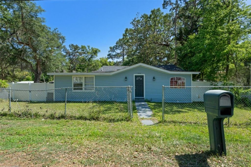 Photo of 19496 Wildwood Drive, Brooksville, FL 34601 (MLS # TB8380713)