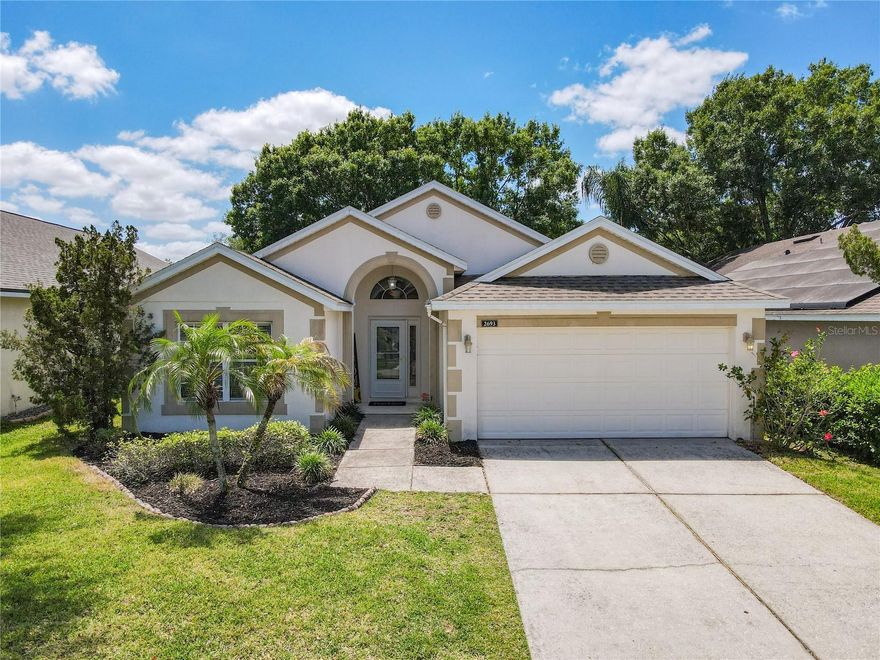 Welcome to 2693 Bellewater Place in Oviedo! Located in the highly desirable, gated community of Cedar Glen of Aloma Woods, this beautiful 3-bedroom, 2-bathroom home is truly move-in ready and PRICED TO SELL! You’ll love the bright, open layout with natural light filling every room and a split floor plan that offers privacy between the primary suite and guest bedrooms.

The spacious living room flows seamlessly into the dining area and kitchen, creating the perfect setup for both everyday living and entertaining. Step outside to the screened-in back porch, ideal for morning coffee, weekend grilling, or simply relaxing while the kids or pets play in the open backyard.

Cedar Glen has A LOW HOA and is a gated community known for its peaceful setting, tree-lined sidewalks, and picturesque ponds, a great place to enjoy evening walks or unwind outdoors.

MAJOR UPDATES FOR PEACE OF MIND FOR YEARS TO COME INCLUDE: ROOF (2018), A/C (2024), WATER HEATER (2020), SQUARE D ELECTRICAL PANEL, A NEWLY INSTALLED RAIN BIRD IRRIGATION CONTROLLER IN GARAGE, LUXURY LAMINATE IN LIVING ROOM, AND UPDATED LANDSCAPING.

This home combines comfort, function, and the convenience of living near Oviedo’s top-rated schools, parks, and shopping. Don’t miss the opportunity to live in one of Oviedo’s most sought-after communities Cedar Glen of Aloma Woods.