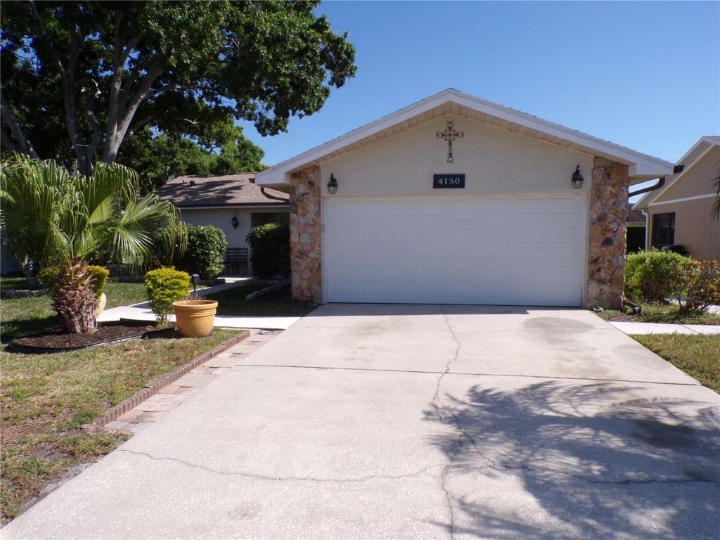 Photo of 4150 104th Avenue N, Clearwater, FL 33762 (MLS # TB8501864)