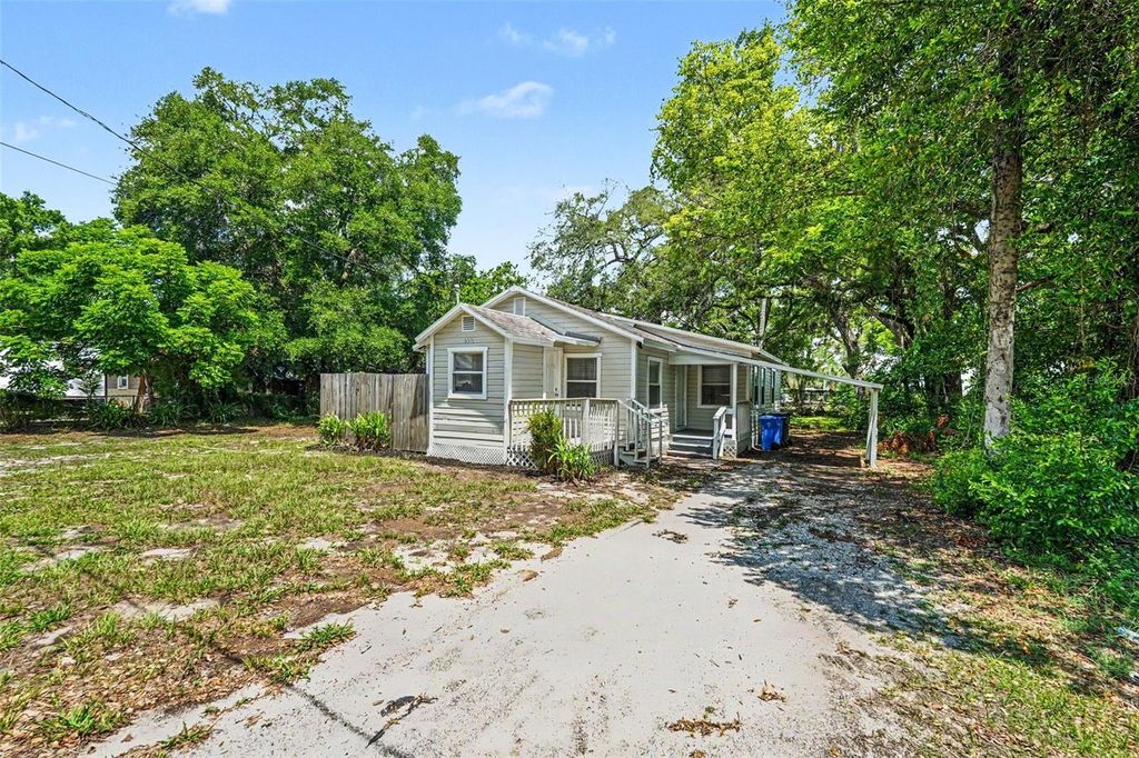 Photo of 828 E 145th Avenue, Tampa, FL 33613 (MLS # O6409491)
