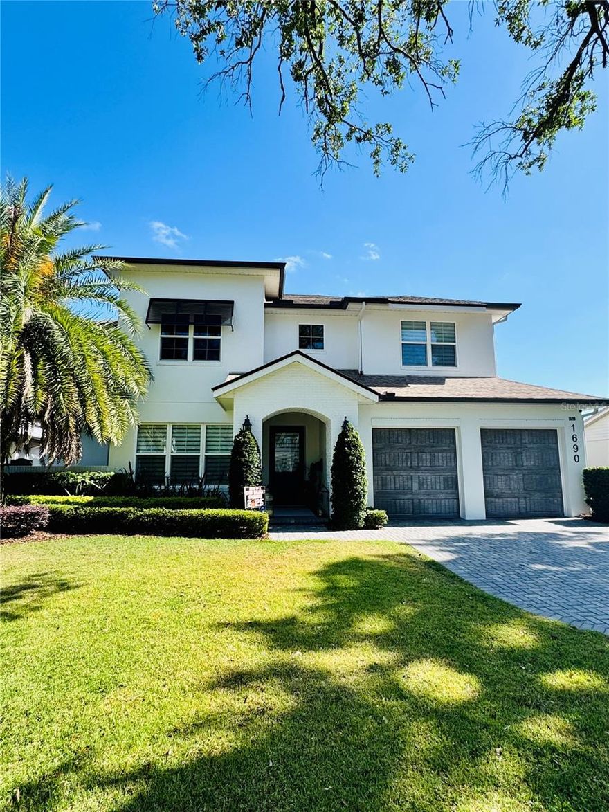 This Fabulous transitional 5 bedroom pool home is perfect for family living & entertaining & just minutes from downtown Winter Park's shopping, entertainment & dining on Park Avenue. Floor plan is ideal w/ 2 bedroom suites downstairs plus office/flex space. Meticulously constructed by Austin Homes, modern & traditional elements blend together w/ its open layout & clean lines. Main floor features a gourmet kitchen w/ Wolf, Sub Zero & Cove stainless appliances, large island, soft close custom wood cabinets & spacious walk-in pantry w/ coffee center/dry bar. This amazing kitchen opens to the family room, exquisite ceiling detail & French doors. The spacious master retreat has a generous walk-in closet. Master bath has a tub, dual vanities & separate shower. Office features a beautiful decorative ceiling design. Private guest suite, laundry & powder bath complete the 1st floor. Upstairs are 3 bedroom suites, a bonus rm, 2nd laundry & a finished walk-in attic. Step outside & relax on your covered lanai w/ summer kitchen or cool off in the sparkling pool/spa w/ sun shelf & heated spa flanked by a large cabana w/ fireplace. Back yard is beautifully landscaped & fenced for privacy. Relax in your private hot tub enclave with television. Amenities include: granite & quartz counter tops, Level 4 smooth finish walls & ceilings, hardwood floors in all main living areas, custom closet systems, brick paved driveway, PGT vinyl Low E insulated windows, core fill & block walls, high density spray foam insulation in ceilings, R13 in walls, Trane 16 Seer variable speed AC dual systems & 2 tankless water heaters.