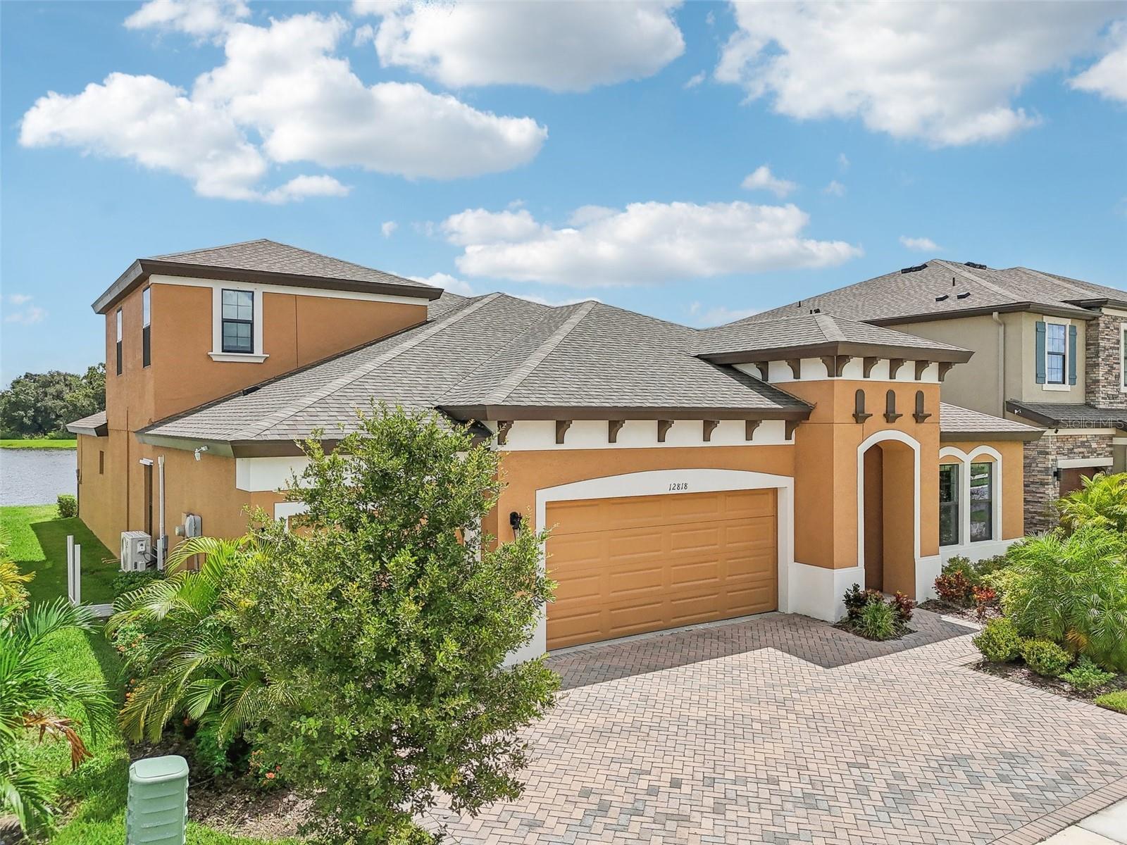 Welcome to Your Dream Home in Triple Creek! This amazing home has an Assumable VA Loan for qualified buyers!!! This
stunning 4-bedroom, 4-bathroom home, built in 2022, offers a unique opportunity to own in one of the area's most sought-after communities.
Boasting 3219 sq. ft., this Swann IV model by West Bay Homes still feels like new construction and is filled with top-tier builder upgrades. As you
step inside, you’ll be greeted by snow- wood tile flooring that flows seamlessly throughout the open-concept floorplan. The heart of the home is
the gourmet kitchen, featuring Kinsdale Duraform Espresso cabinets, luxurious Calacatta Villa Quartz countertops, and high-end finishes. Also
included in this custom built kitchen are a double oven, stainless steel appliances, and massive island that serves as the center of attraction! The
property is perfectly positioned to provide breathtaking deep water views and serene conservation areas, making it a tranquil retreat. The master
suite offers privacy with a luxurious walk-in shower, double vanities, and an oversized walk-in closet. Additionally, a spacious upstairs bonus room
and a powder room add extra versatility to this already expansive home. Step outside and take your breath away as you enjoy the mind-blowing
views of the waterfront, and take a load off and simply relax! Triple Creek’s premier amenities include two separate clubhouses, multiple pools, a
splash pad, tennis and basketball courts, safe walking and biking trails, several playgrounds, and well-equipped fitness centers. This exceptional
home won’t last long—schedule your appointment today to experience all that it has to offer!