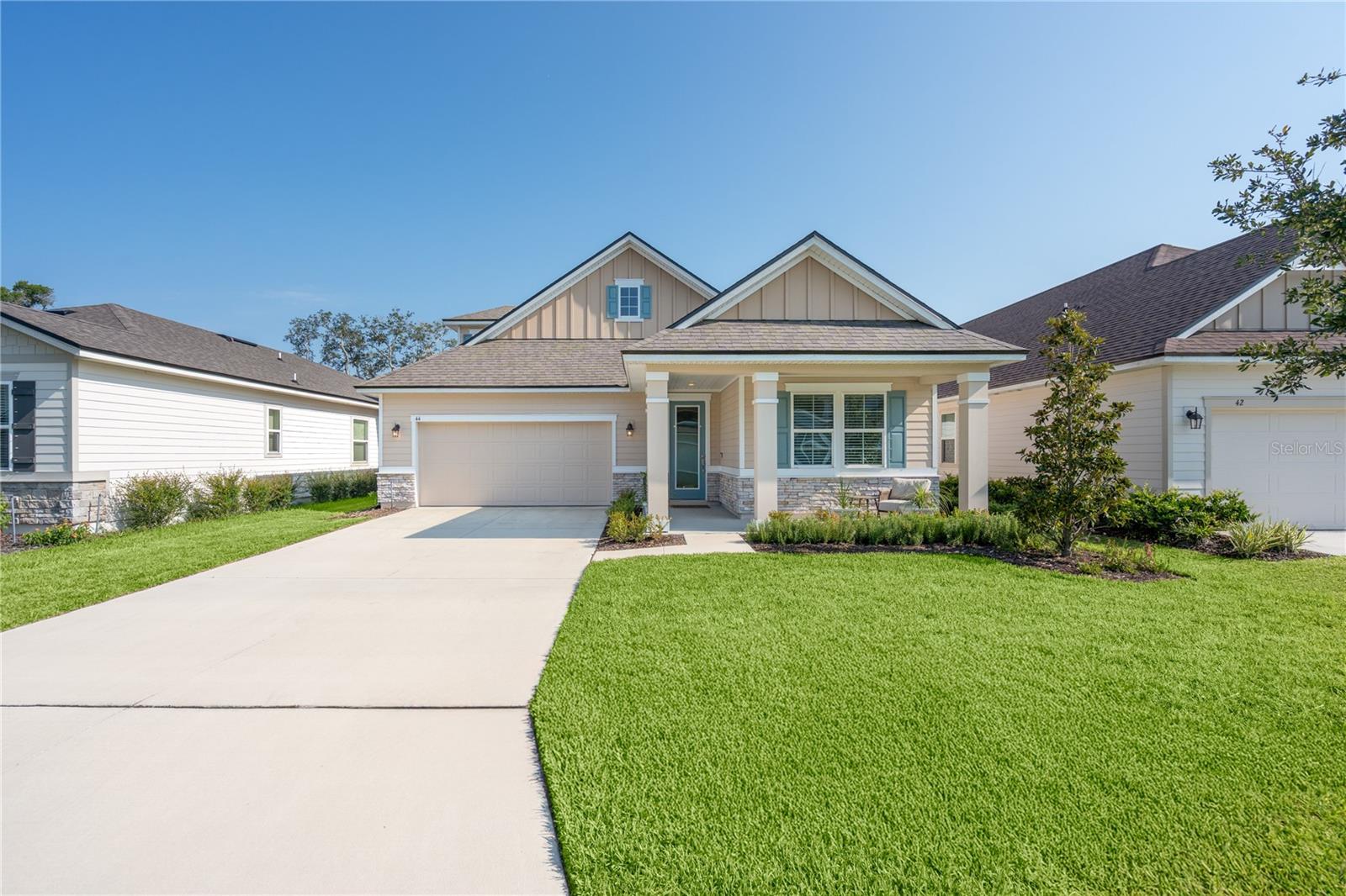 Experience the best of coastal living! This upgraded 2023-built and beautifully designed Appleby home is only steps from the beach and ready for you to make it your own. This lovely home is just a short walk to Jungle Hut Park Beach with restrooms and showers, as well as Bings Landing boat and kayak launch on the Intracoastal Waterway. In addition, you will find Publix, the Community Bridge, and renowned private clubs Hammock Dunes and Hammock Beach less than 2 miles from your beach house.
The open-concept layout centers around a bright white kitchen with a large island that flows seamlessly into the spacious family room and breakfast area—large enough to double as a formal dining space. Neutral palette and amazing natural light create a relaxing beachside vibe throughout. The entry foyer welcomes you with an obscured glass insert door for added light, while the split-bedroom design provides privacy. The primary suite offers a luxurious bath with dual vanities, a generous walk-in closet, and an oversized walk-in tile shower with transoms.
Outdoors, the fenced and landscaped backyard creates a private retreat, complete with a covered porch ideal for relaxing or dining outdoors, and plenty of room for a pool. A thoughtfully designed laundry room is also plumbed for a sink, if desired.
This charming coastal community offers low HOA fees, a peaceful lake with walking paths, a community garden, a playground, and a short walk to our famous sandy beaches. Active lifestyle seekers will appreciate the nearby walking and biking trails, while the location puts you minutes from excellent dining, shopping, and Yacht Harbor Marina. Just minutes from I-95, you can enjoy the vibrant nightlife of Daytona Beach or the historic charm of St. Augustine—both only a 30-minute drive away.
Blending modern elegance with coastal convenience and the warmth of a close-knit community, this home truly has it all. Now is your chance to own your piece of paradise!