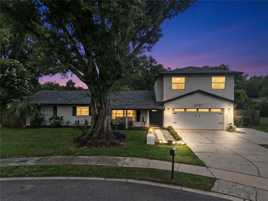 Photo of 3237 Kew Gardens Lane, Orlando, FL 32812 (MLS # O6425858)