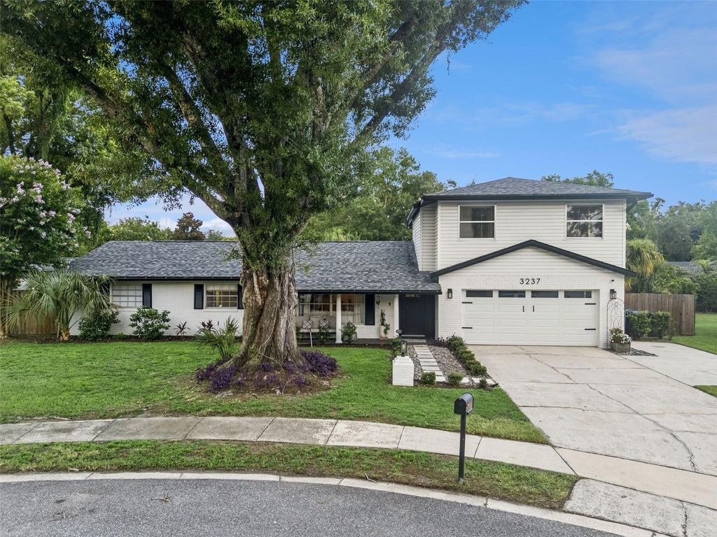 Photo of 3237 Kew Gardens Lane, Orlando, FL 32812 (MLS # O6425858)