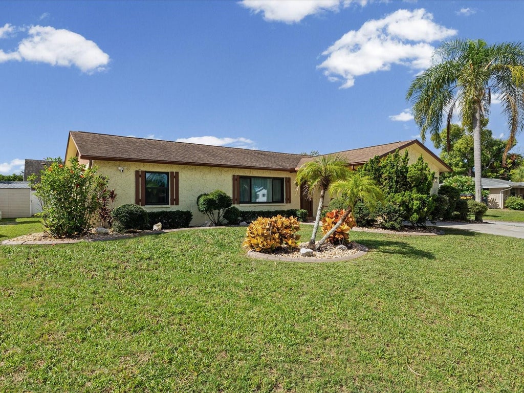 Photo of 7120 Coral Reef Drive, Port Richey, FL 34668 (MLS # W7889120)