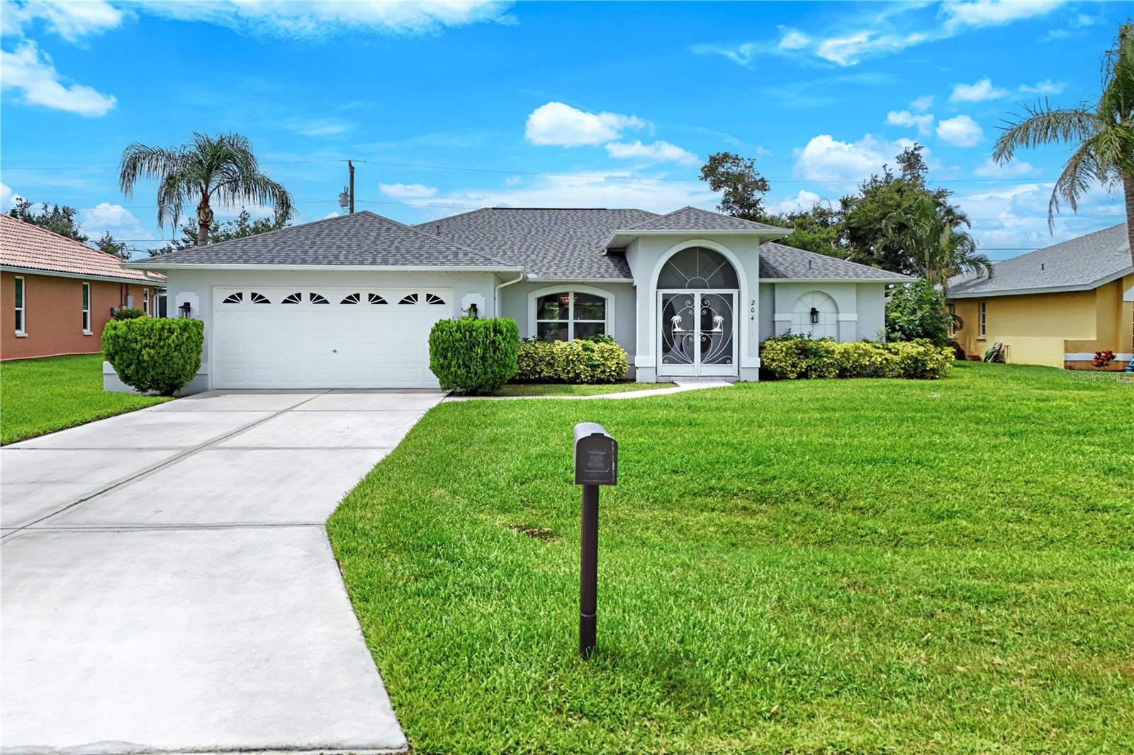 Immaculate 3-Bedroom Home Near Midpoint Bridge Welcome to this beautifully maintained home in the desirable SE Cape Coral neighborhood—perfectly positioned near the Midpoint Bridge for easy access to Fort Myers, shopping, dining, and schools. Offering over 1,500 sq. ft. of living space, this light and bright residence features a spacious great room floor plan with soaring cathedral ceilings and thoughtful upgrades throughout. Recent updates include: a new roof, new A/C, new hot water heater, new bathroom faucets, plush new carpet in the guest bedrooms, and a fresh coastal-style kitchen boasting quartz countertops with a subtle shimmer, new stainless steel appliances, a single-basin farmhouse sink, and updated cabinet hardware. The split-bedroom layout includes 3 bedrooms and 2 full baths, with the guest bath doubling as a convenient future pool bath. Step outside to a large screened lanai with plenty of room to add your dream pool—the lot is spacious and already connected to city water and sewer (fully paid), and best of all, not in a flood zone! Located on a quiet street, this home offers peace and privacy with everything you need just minutes away. Don’t miss this move-in-ready gem in one of Cape Coral’s most convenient locations!