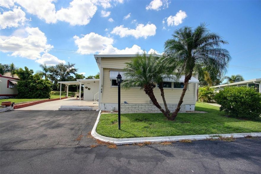 Welcome to your charming and fully-furnished mobile home nestled in the heart of a vibrant community! This delightful 2-bedroom, 1 bathroom residence offers a warm and inviting atmosphere with its open floor plan and waterproof vinyl flooring throughout most of the home. Enjoy the convenience of a carport and additional parking space for two cars in the driveway. Dive into relaxation with the heated pool or gather with friends at the clubhouse with kitchen facilities. The community boasts amenities like shuffleboard courts, billiards/card room, horseshoe pits, bocce court, laundry room, library, and a mail center. For added convenience, there's RV and boat storage available for an extra fee. Entertainment options are endless, ranging from bingo, crafts, and cards to holiday parties, dances, and dinners. Take part in coffee hours, pancake breakfasts, ladies' luncheons, and potluck dinners. Join golf and bowling leagues for some friendly competition. The location is ideal, just minutes away from some of the world's most famous beaches, numerous restaurants, and 15 minutes to Sarasota Bradenton International Airport. Tampa International Airport is a short 45-minute drive away, along with the UTC Mall and St Armands Circle. Don't miss the opportunity to make this vibrant community your new home!